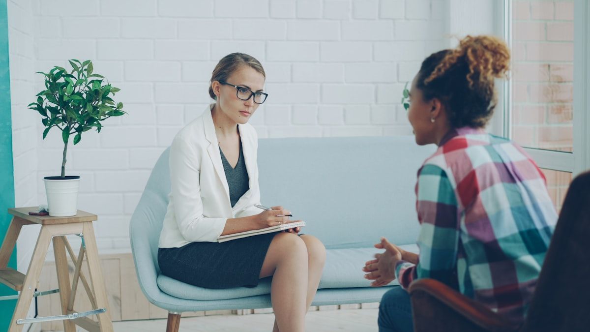 A clinician listening attentively during an assessment